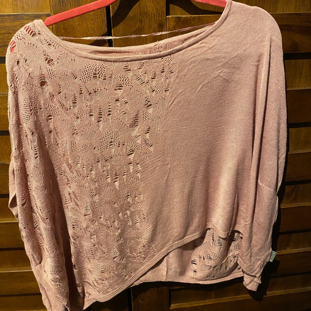 Short sleeve blouse. Never worn but washed.